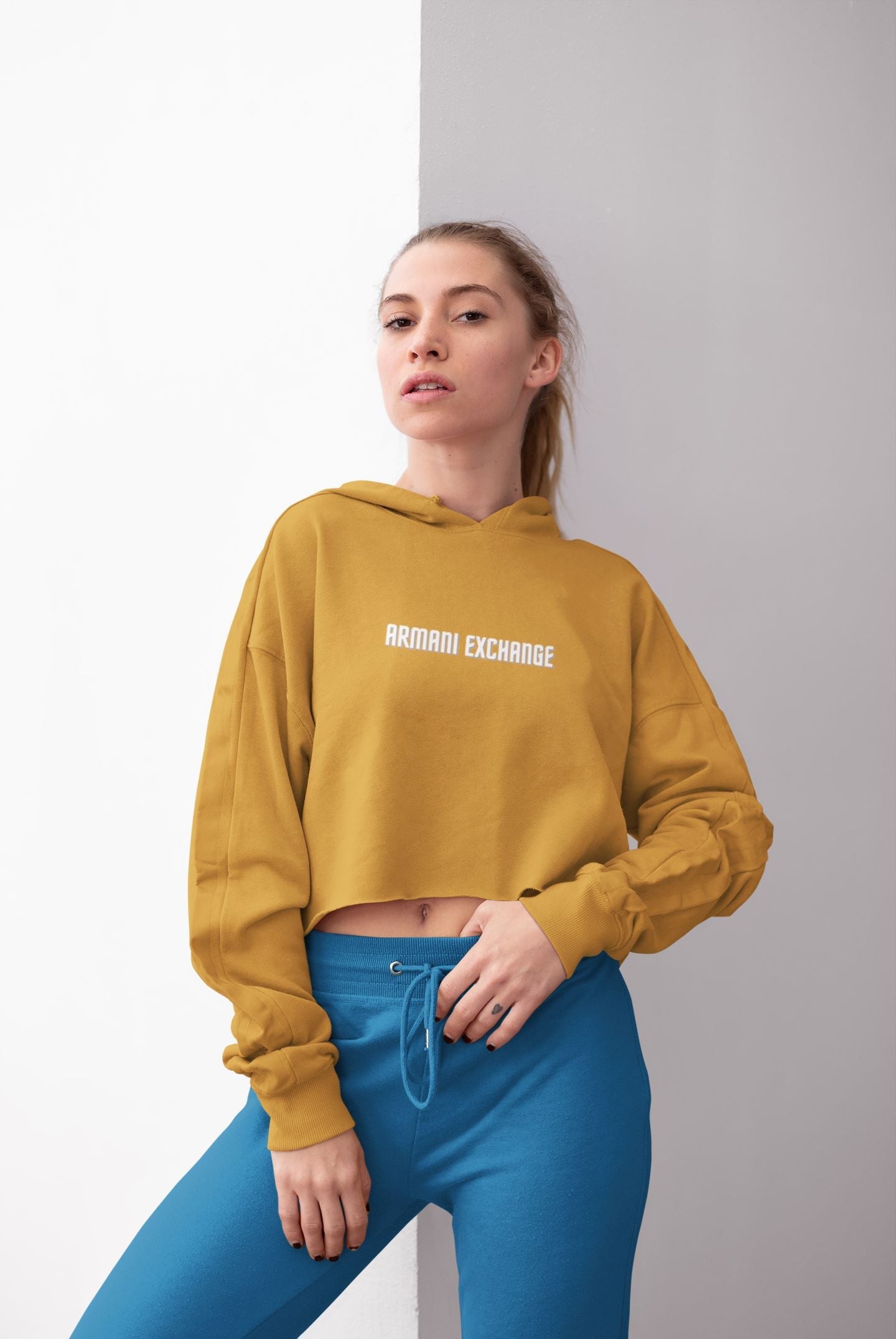 Women wearing Mustard Yellow Half Sleeve T-shirt with Printed Armani Exchange Custom Logo